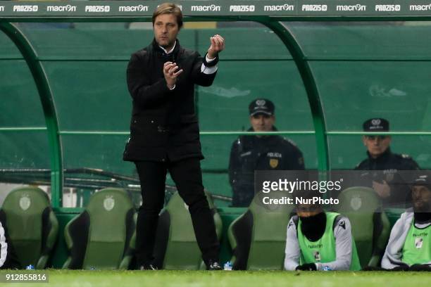 Guimaraes's coach Pedro Martins gestures from the sideline during the Portuguese League football match between Sporting CP and Vitoria SC at Jose...
