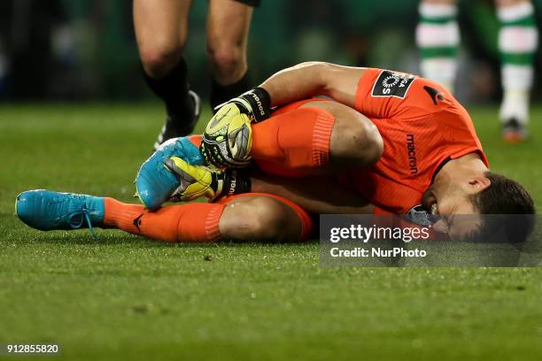 Guimaraes's goalkeeper Douglas Jesus injured on the pitch during the Portuguese League football match between Sporting CP and Vitoria SC at Jose...