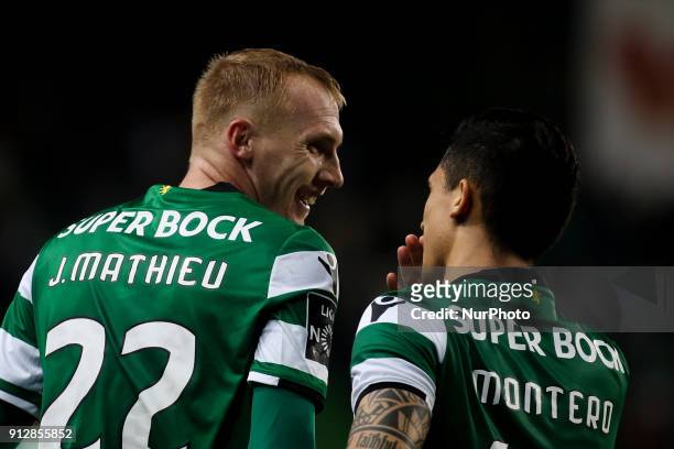 Sporting's defender Jeremy Mathieu celebrates with Sporting's forward Montero after scoring during the Portuguese League football match between...