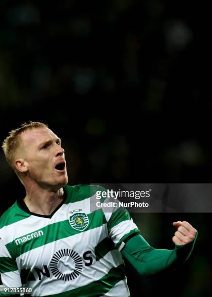 Sporting's defender Jeremy Mathieu celebrates after scoring during the Portuguese League football match between Sporting CP and Vitoria SC at Jose...