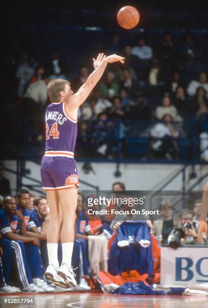 Tom Chambers of the Phoenix Suns shoots against the Washington Bullets during an NBA basketball game circa 1990 at the Capital Centre in Landover,...