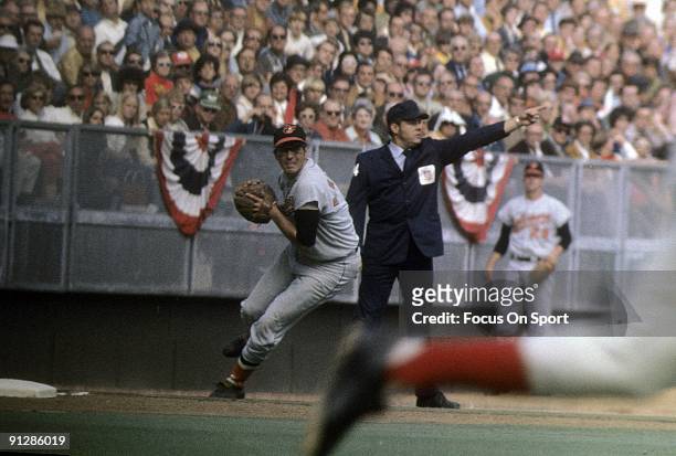 Infielder Brooks Robinson of the Baltimore Orioles in action at third base against the Cincinnati Reds during a world series game October 1970 at...