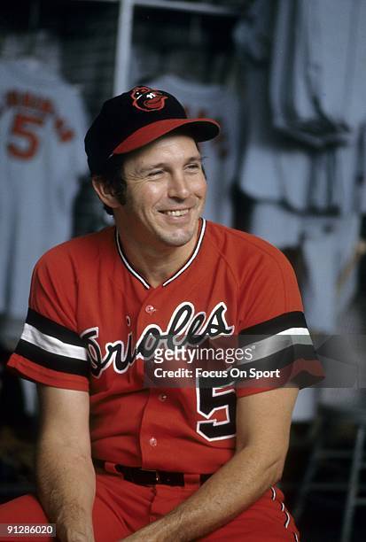 S: Third baseman Brooks Robinson of the Baltimore Orioles sitting in front of his locker before a circa 1970's Major League Baseball game at Memorial...