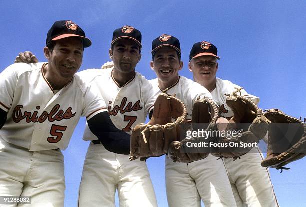 Infielder Brooks Robinson, Mark Belanger, Davey Johnson, second from right and Boog Powell, far righr, of the Baltimore Orioles poses for this photo...