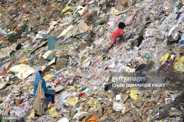 Indian Rag Pickers 362 Pile Of Rags Stock Photos, High-Res Pictures, and Images - Getty Images