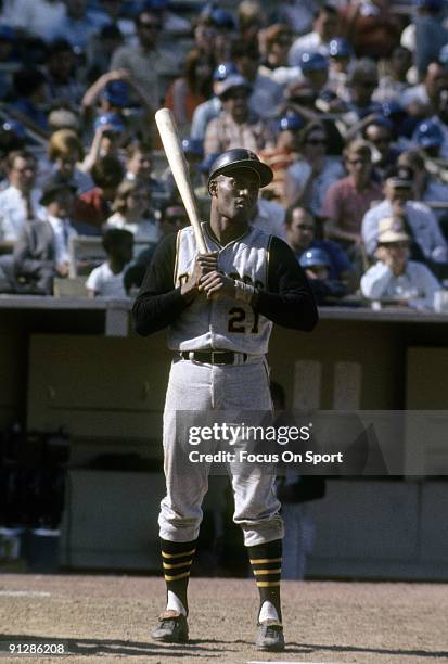 S: Outfielder Roberto Clemente Pittsburgh Pirates standing at home-plate with bat in hand during a MLB baseball game against the New York Mets circa...