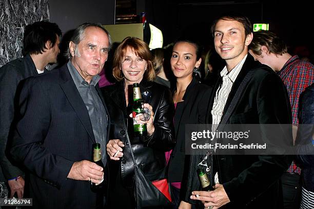 Michael Verhoeven and wife, actress Senta Berger and son Luca and wife Stephanie Verhoeven attend the premiere of 'Maennerherzen' at CineMaxx at...