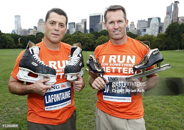 Former NHL great Pat LaFontaine and olympic speedskating gold medalist Dan Jansen attend a portrait session in Central Park for ING's Run For...