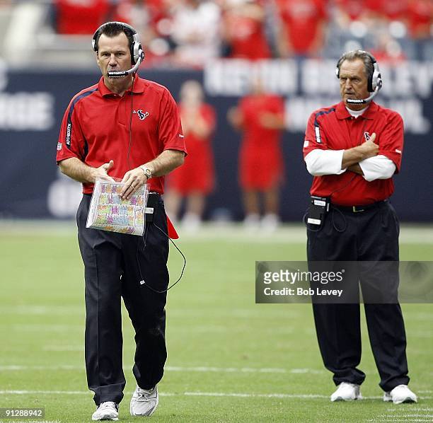 Head coach Gary Kubiak of the Houston Texans. Left, and assistant head coach/offense Alex Gibbs look on during the game against the Jacksonville...