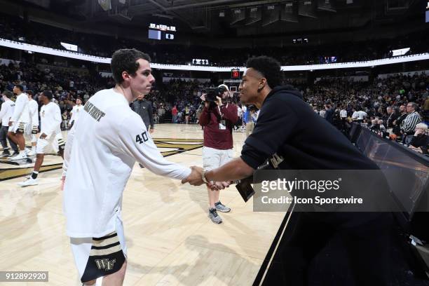 Wake Forest's Anthony Bilas and former player and current Atlanta Hawk John Collins . The Wake Forest University Demon Deacons hosted the Duke...
