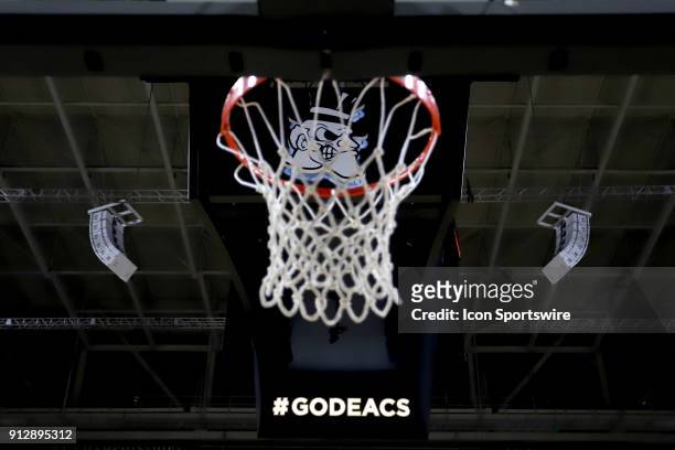 The Demon Deacon logo on the scoreboard can be see through the basket. The Wake Forest University Demon Deacons hosted the Duke University Blue...