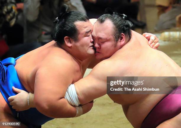 Kotoshogiku and Takarafuji compete during day fifteen of the Grand Sumo New Year Tournament at Ryogoku Kokugikan on January 28, 2018 in Tokyo, Japan.