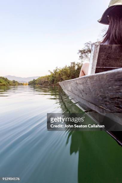 boating on the nam song river - nam song river stock pictures, royalty-free photos & images