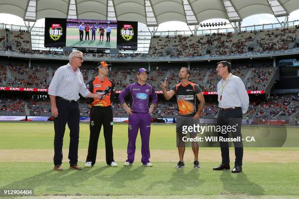 Adam Voges of the Scorchers and George Bailey of the Hurricanes look on at the coin toss prior to the Big Bash League Semi Final match between the...
