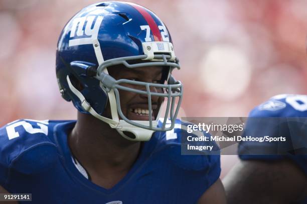 Osi Umenyiora of the New York Giants during a NFL game against the Tampa Bay Buccaneers at Raymond James Stadium on September 27, 2009 in Tampa,...
