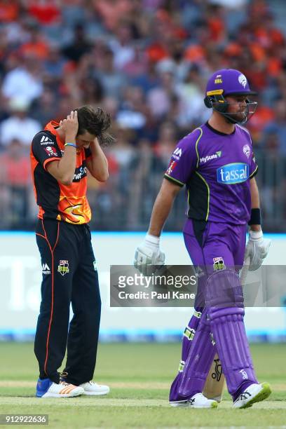 Jhye Richardson of the Scorchers reacts after being hit to the boundary during the Big Bash League Semi Final match between the Perth Scorchers and...