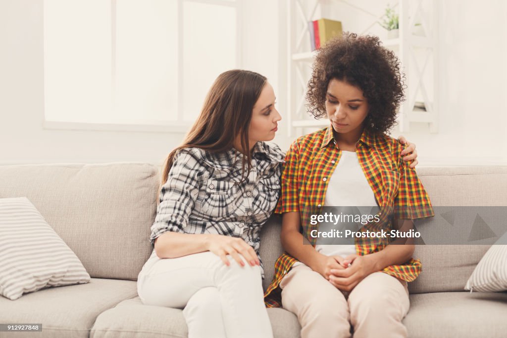 Two women talking about problems at home