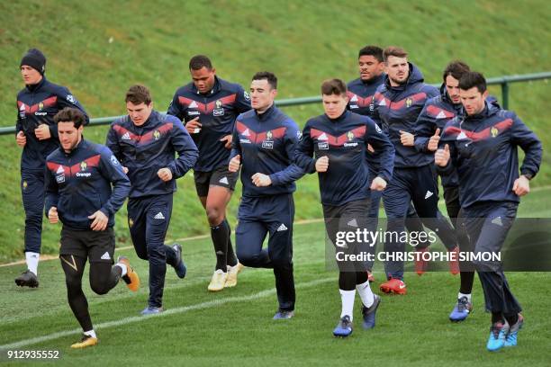 French rugby union national team players run during a training session two days ahead of a Six Nations match against Ireland on February 1, 2018. /...