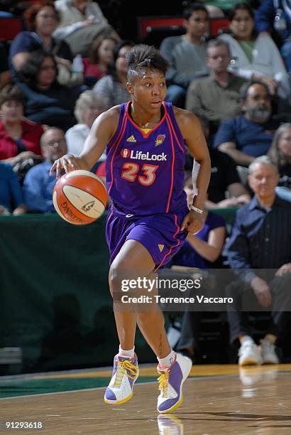 Cappie Pondexter of the Phoenix Mercury drives the ball up court during the WNBA game against the Seattle Storm on September 10, 2009 at the Key...