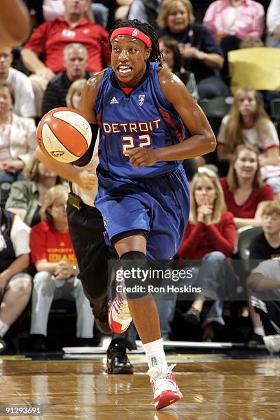 Alexis Hornbuckle of the Detroit Shock moves the ball up court against the Indiana Fever in Game Three of the Eastern Conference Finals during the...