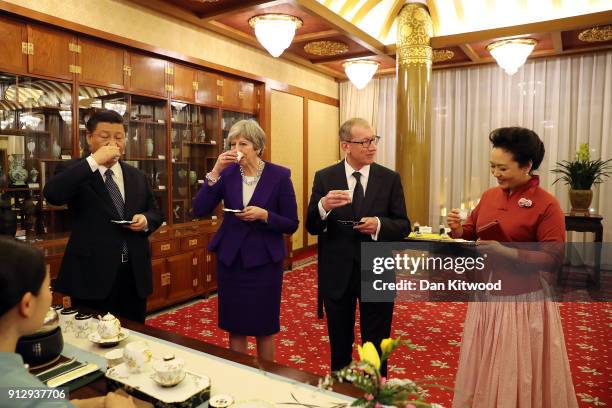 British Prime Minister Theresa May and her husband Philip take part in a Tea Ceremony with Chinese President Xi Jinping and his wife Peng Liyuan at...