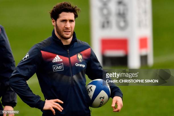French rugby union national team scrumhalf Maxime Machenaud attends a training session two days ahead of a Six Nations match against Ireland on...