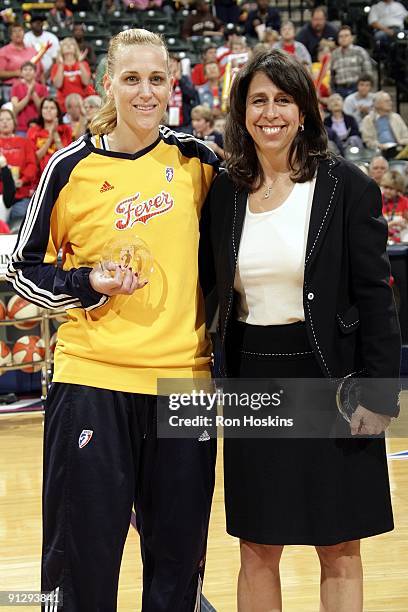 Katie Douglas of the Indiana Fever poses for a photo with WNBA commissioner Donna Orender after being named into the All-WNBA First Team prior to...