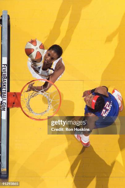 Tammy Sutton-Brown of the Indiana Fever shoots a layup against Alexis Hornbuckle of the Detroit Shock in Game Two of the Eastern Conference Finals...