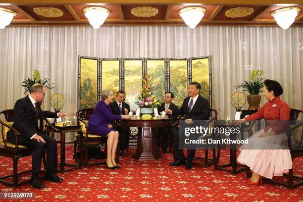 British Prime Minister Theresa May and her husband Philip take part in a Tea Ceremony with Chinese President Xi Jinping and his wife Peng Liyuan at...