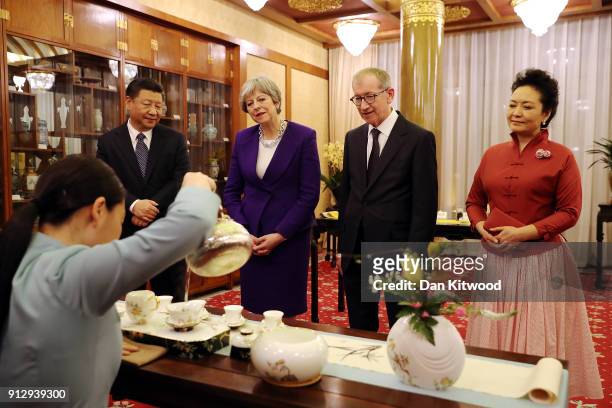 British Prime Minister Theresa May and her husband Philip take part in a Tea Ceremony with Chinese President Xi Jinping and his wife Peng Liyuan at...