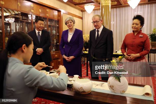 British Prime Minister Theresa May and her husband Philip take part in a Tea Ceremony with Chinese President Xi Jinping and his wife Peng Liyuan at...
