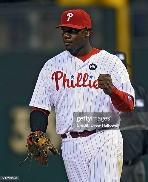 Ryan Howard of the Philadelphia Phillies pumps his fist after getting the last out of the game beating the Houston Astros 10-3 and winning the...