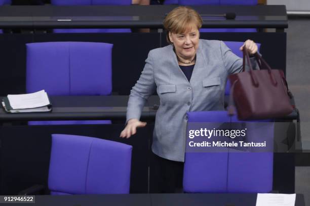 Germany Chancellor Angela Merkel arrives in the Plenary Hall of the Parliament or Bundestag ahead of the debate on Refugee rights to Family...