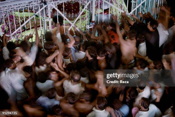 During the annual celebration of Urs of Lal Shabaz Qalandar, a 13th century Sufi Master worshiped alike by Hindus and Muslims, a group of pilgrims...