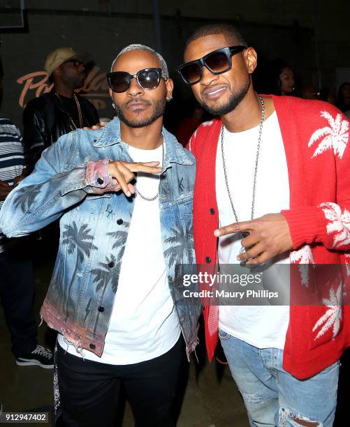 Eric Bellinger and Usher Raymond attend Eric Bellinger's Reveal Party hosted by Teyana Taylor and Wale on January 31, 2018 in Burbank, California.