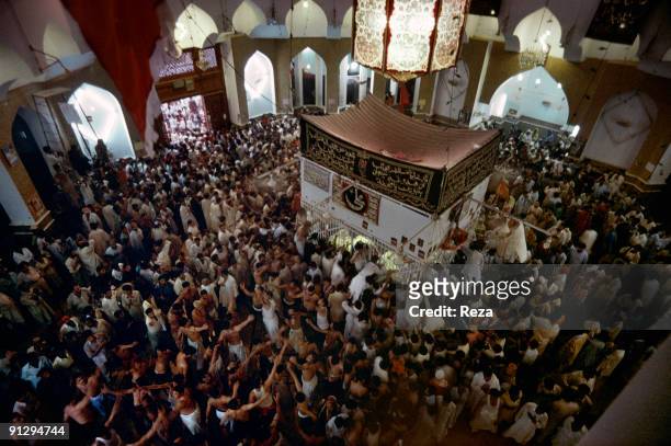 View of the tomb of Lal Shahbaz Qalandar, a 13th century Sufi Master worshiped alike by Hindus and Muslims, September, 2006 in Sehwan Sharif,...