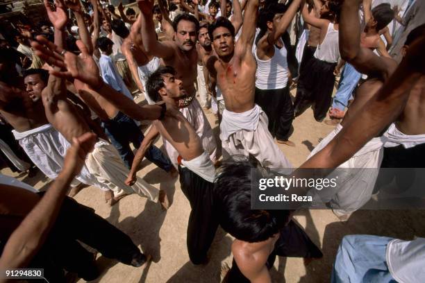 Self mutilation of Shi'as, during the annual ceremony of Urs of Lal Shabaz Qalandar at the entrance of his shrine, September, 2006 in Sehwan Sharif,...