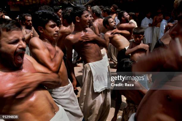 Self mutilation of Shi'as, during the annual ceremony of Urs of Lal Shabaz Qalandar at the entrance of his shrine, September, 2006 in Sehwan Sharif,...