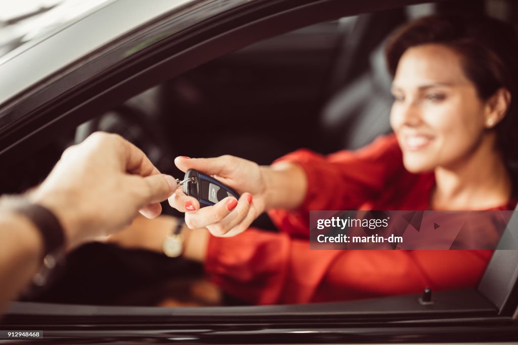 Businesswoman buying car