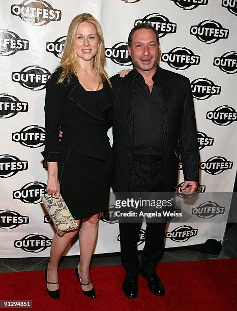 Actress Laura Linney and writer/director/producer Alan Poul arrive at Outfest's 2009 Legacy Awards at the DGA Theatre on September 30, 2009 in West...
