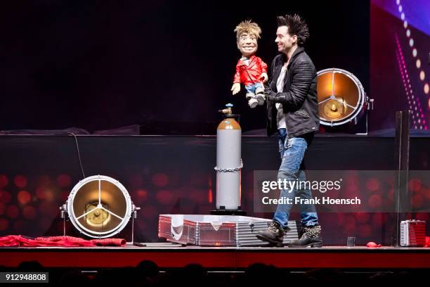 German Magicians Christian Ehrlich and Andreas Ehrlich of Ehrlich Brothers perform live on stage during their show at the Mercedes-Benz Arena on...
