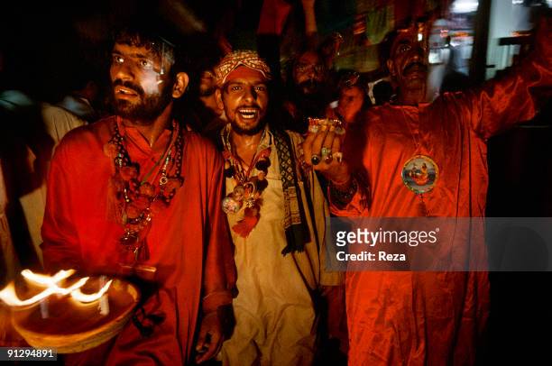 Portraits of dervishes in Sehwan sharif during annual celebration of Urs of Lal shahbaz Qalandar, a 13th century Sufi Master worshiped alike by...