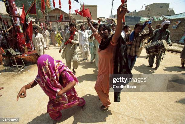 Group of pilgrims performing Dhmal towards the shrine of Bodla Bahar, one of the main disciples of Lal Shahbaz Qalandar, a 13th century Sufi Master...