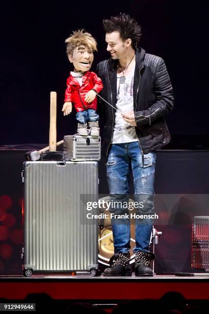 German Magicians Christian Ehrlich and Andreas Ehrlich of Ehrlich Brothers perform live on stage during their show at the Mercedes-Benz Arena on...