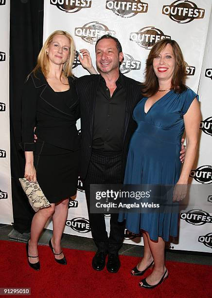 Actress Laura Linney, writer/director/producer Alan Poul and Outfest executive producer Kirsten Schaffer arrive at Outfest's 2009 Legacy Awards at...