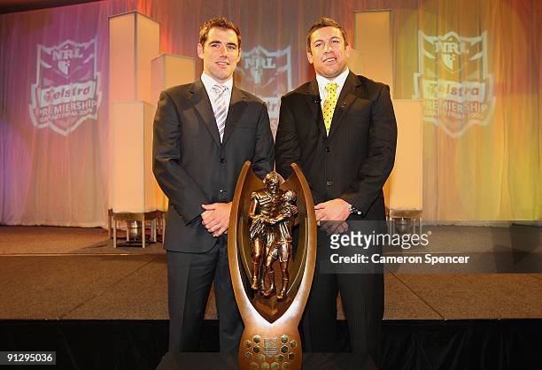 Storm captain Cameron Smith and Eels captain Nathan Cayless pose with the Telstra Premiership Trophy during the 2009 NRL Grand Final Breakfast at...