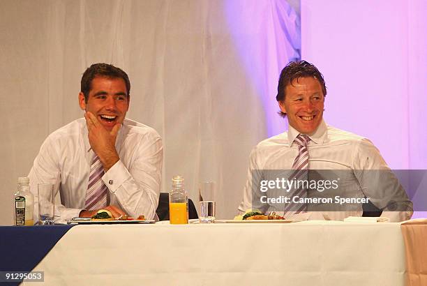Storm captain Cameron Smith and Storm coach Craig Bellamy laugh during the 2009 NRL Grand Final Breakfast at Sydney Convention & Exhibition Centre on...