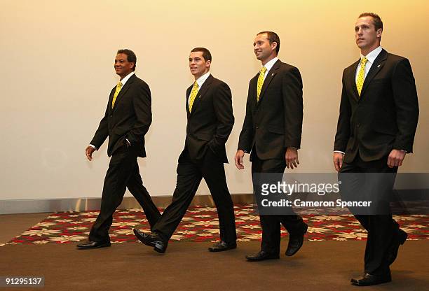 Eels players Daniel Mortimer , Luke Burt and Jeff Robson walk into the 2009 NRL Grand Final Breakfast at Sydney Convention & Exhibition Centre on...