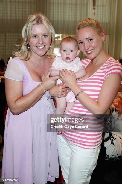 Of the McGrath Foundation Tracy Bevan and TV Personality, Radio Host and Author Bessie Bardot with her baby Bluebell pose during the McGrath...