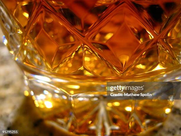 scotch in a crystal glass - kristallglas stock-fotos und bilder